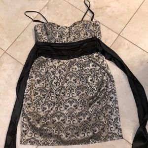 Silver dress with black belt